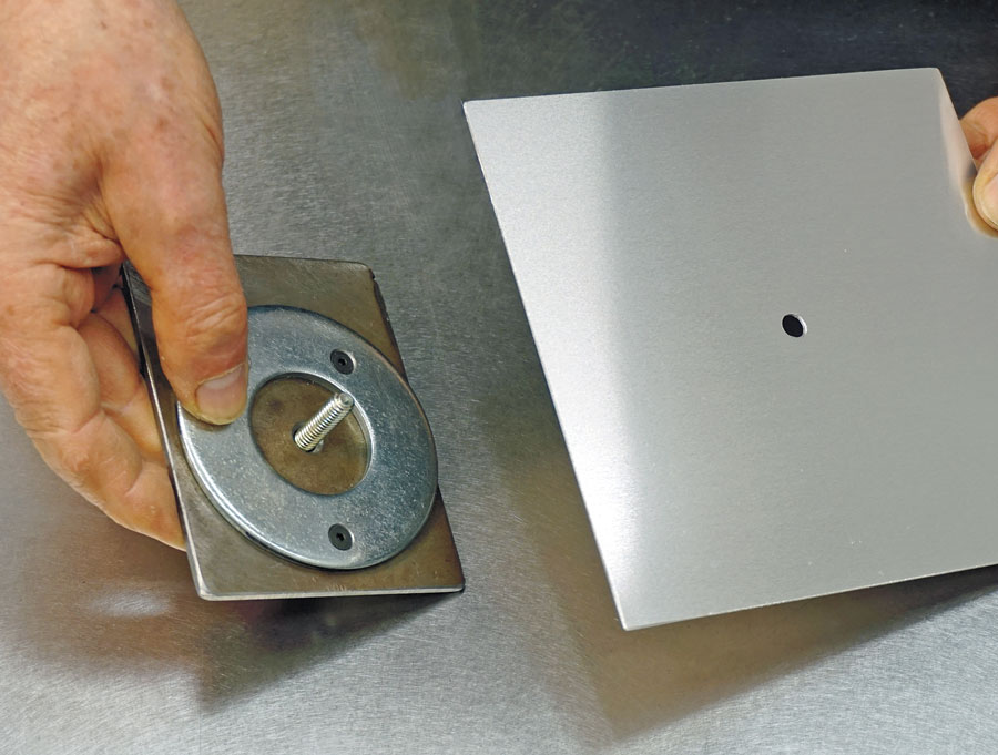 02: A 1/4-inch hole is drilled in the blank to be formed