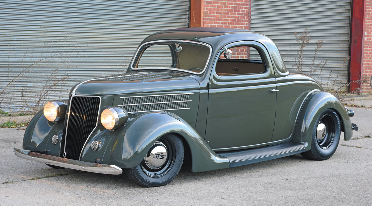 1936 Ford Coupe with headlights on