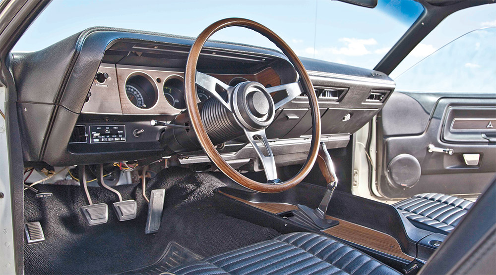 The Challenger cabin and the original Hurst “Pistol Grip” shifter 