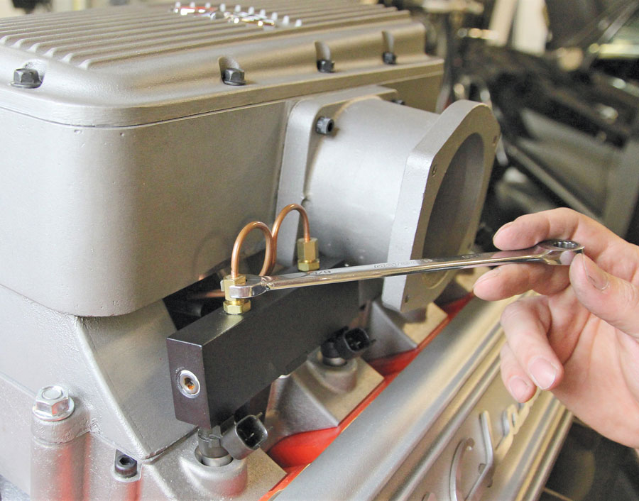 17: There are eight decorative 1/8-inch copper lines that can now be fitted to the fittings on top of the fuel rails