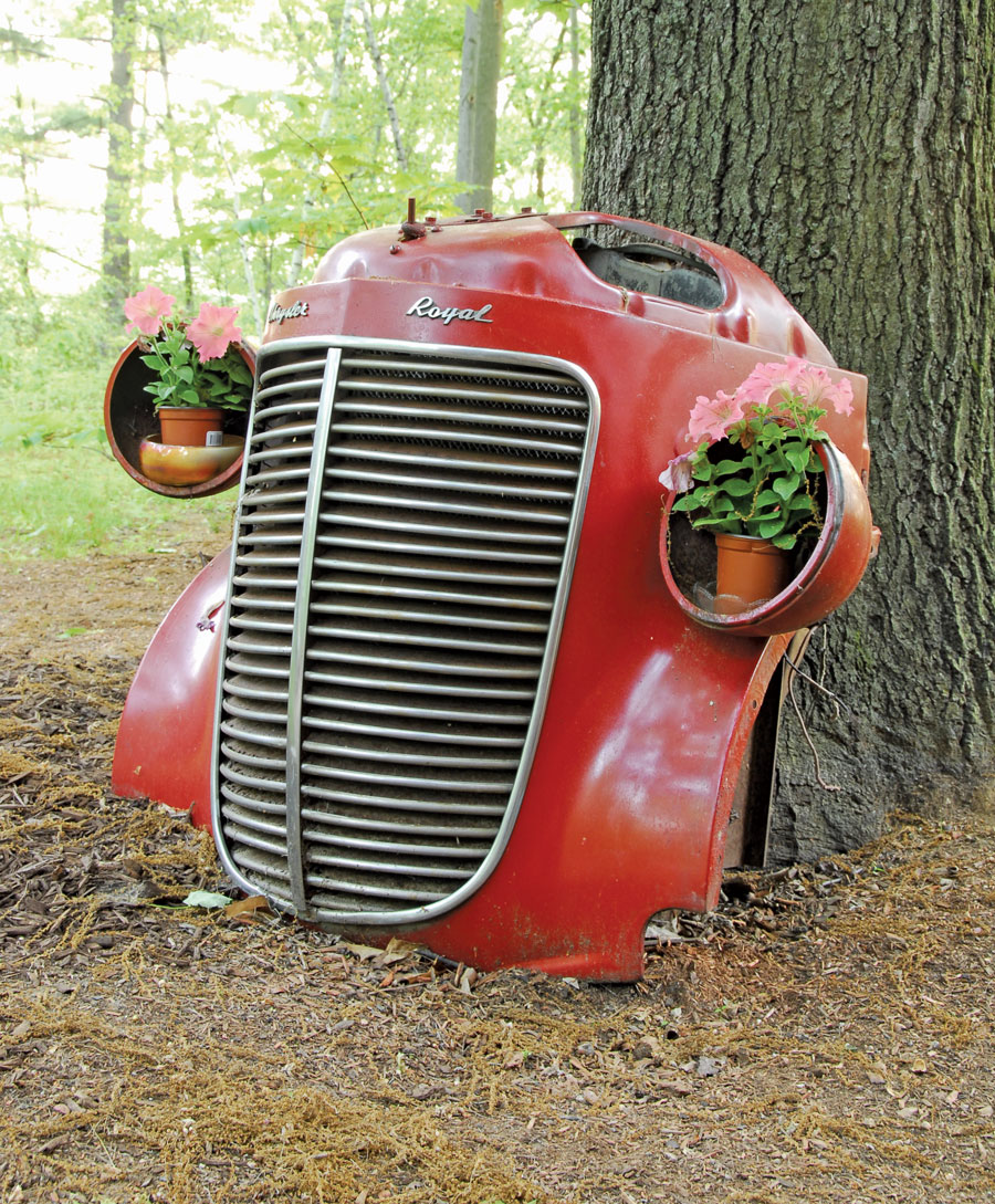Sometimes parts get repurposed, like this old Chrysler grille being converted into a planter by Lisa