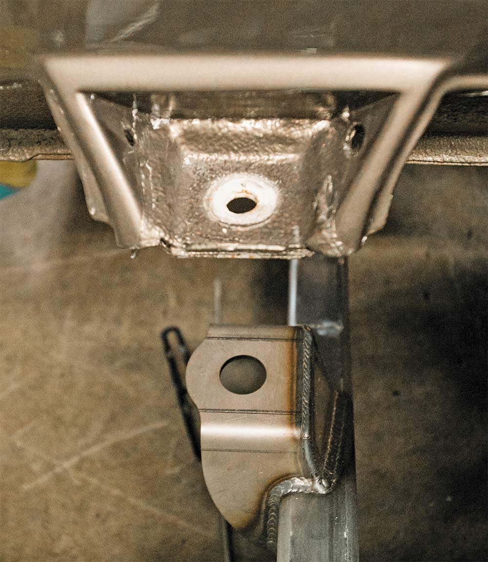 Two forward body mount points (driver side)