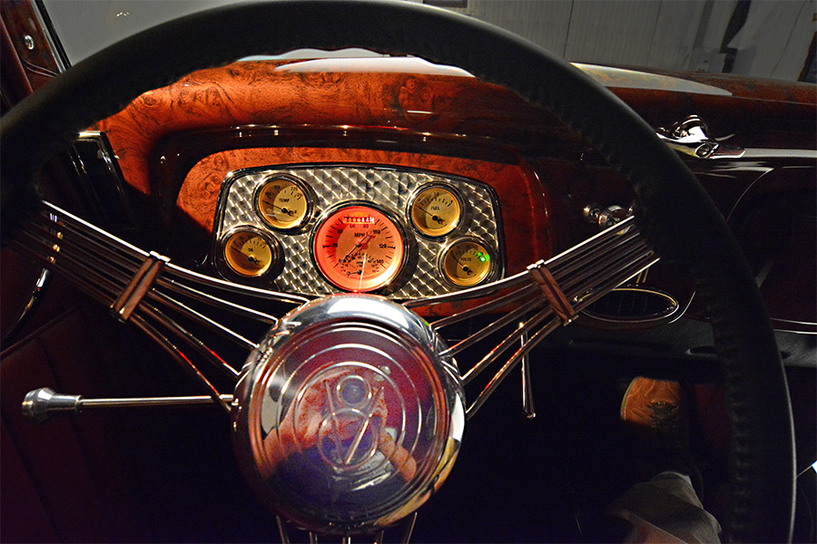 1933 Ford Coupe interior steering wheel closeup of dashboard