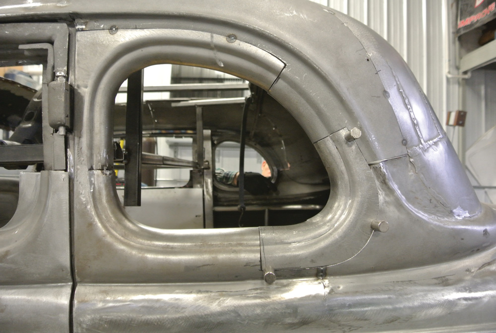 View of the driver side quarter-window after corner replacement