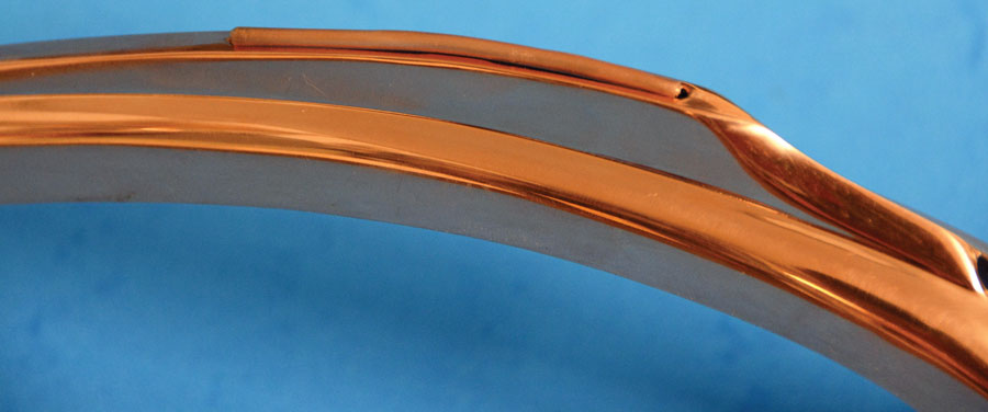 10: After arching a piece of ¼-inch copper tubing to fit the profile we checked it for fit