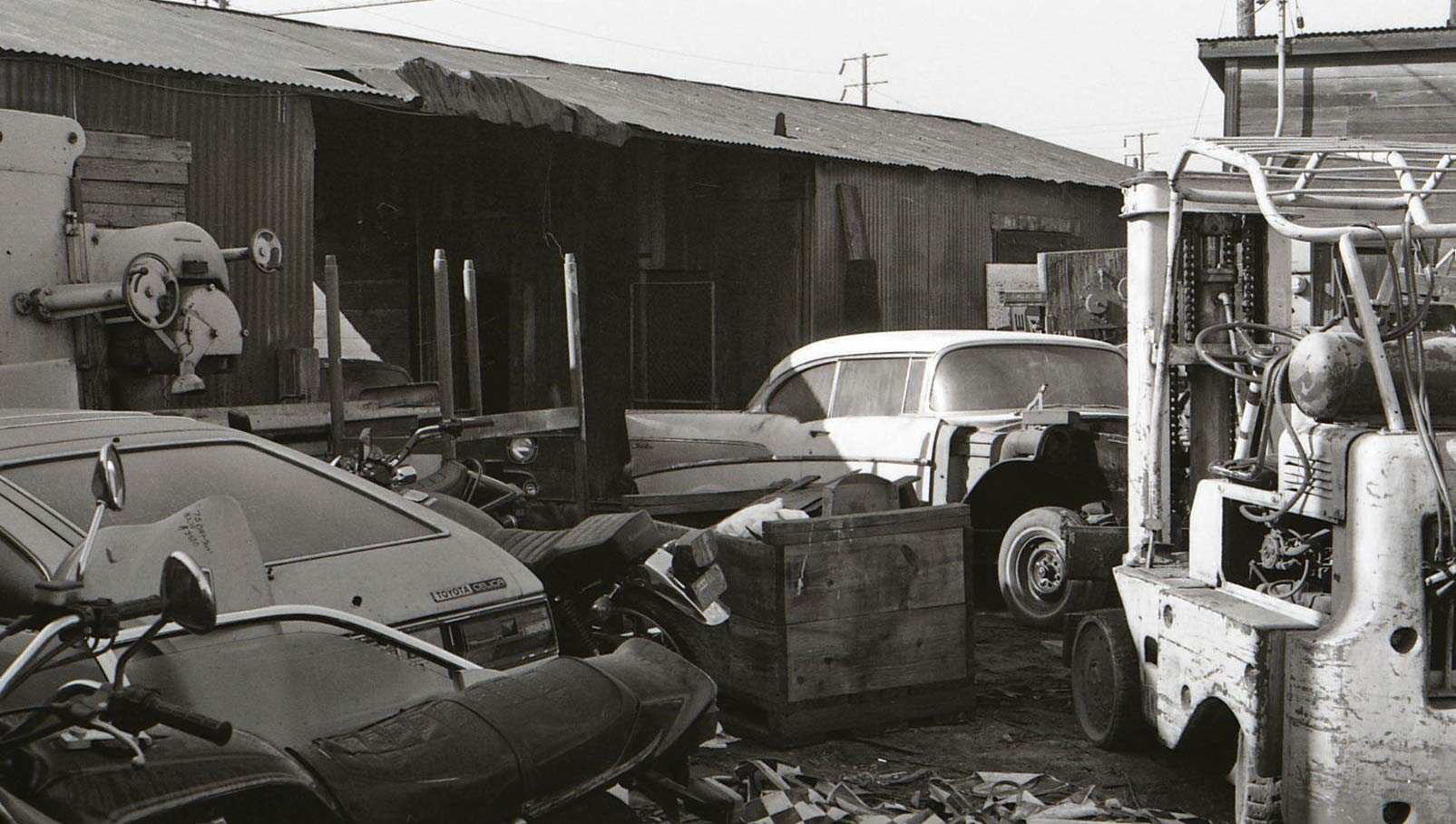 A small tire shop across the street was kept busy salvaging flat tires and selling us some used ones so the cars could be moved