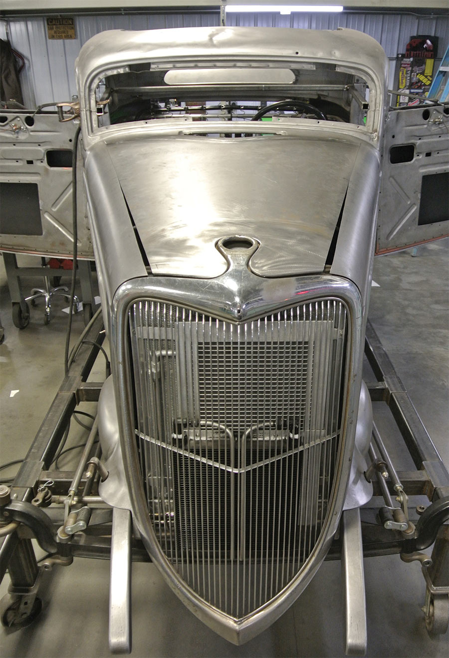 both outer panels fitted to the car and the centerskin of the hood