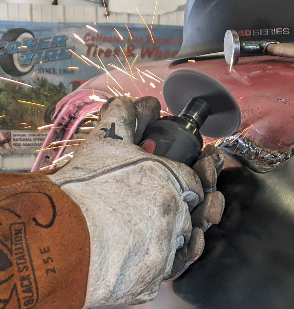 Using a 3/16-inch grind wheel you can now clean up the welds