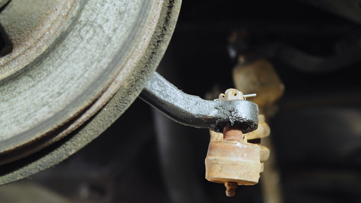 close view of rod end missing rubber boot