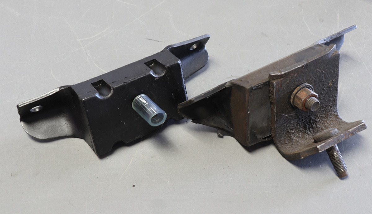 a new motor mount next to an old motor mount