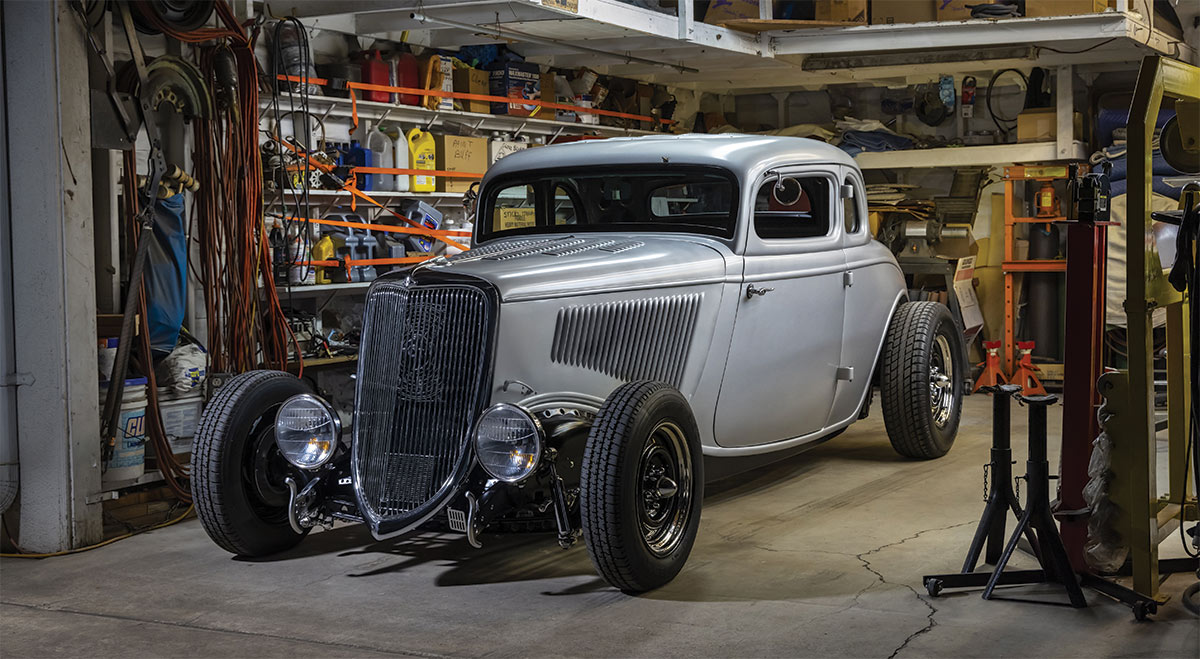 1934 Ford inside of garage with dimmed lighting