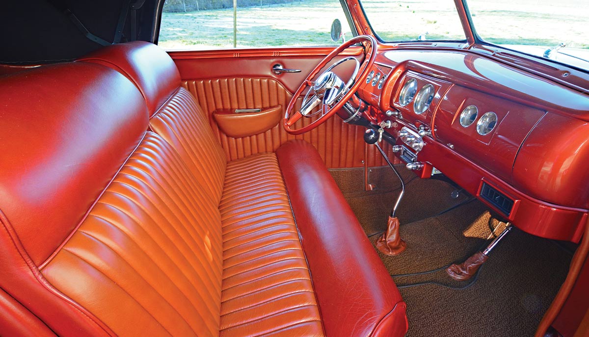 interior front seat with red upholstry