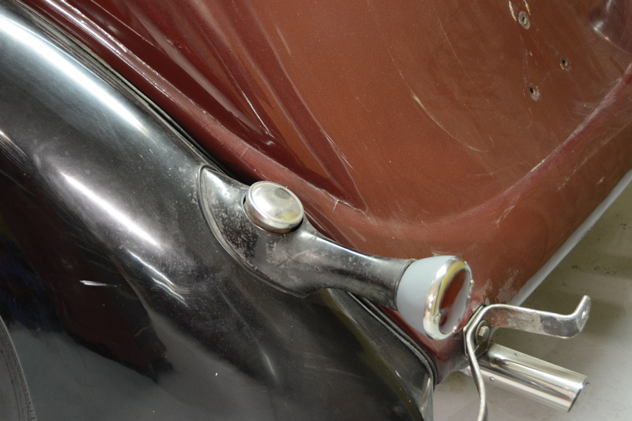 original 1936 Ford fill cap was located through the driver side taillight
