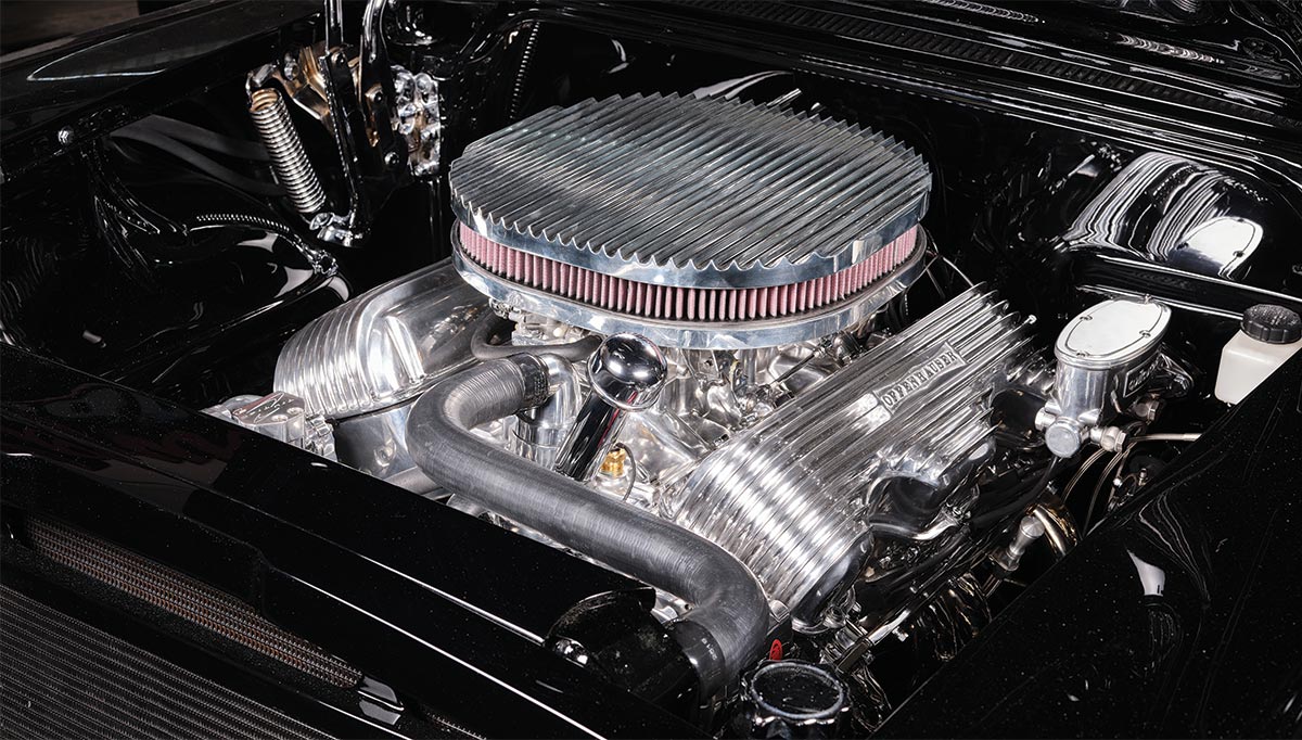 1958 Chevy Impala engine under hood closeup