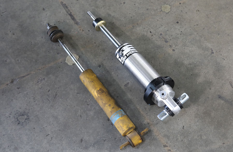 13: The soon-to-be-trashed, OEM-style shock is on the left, with the new billet single-adjustable coilover shock on the right