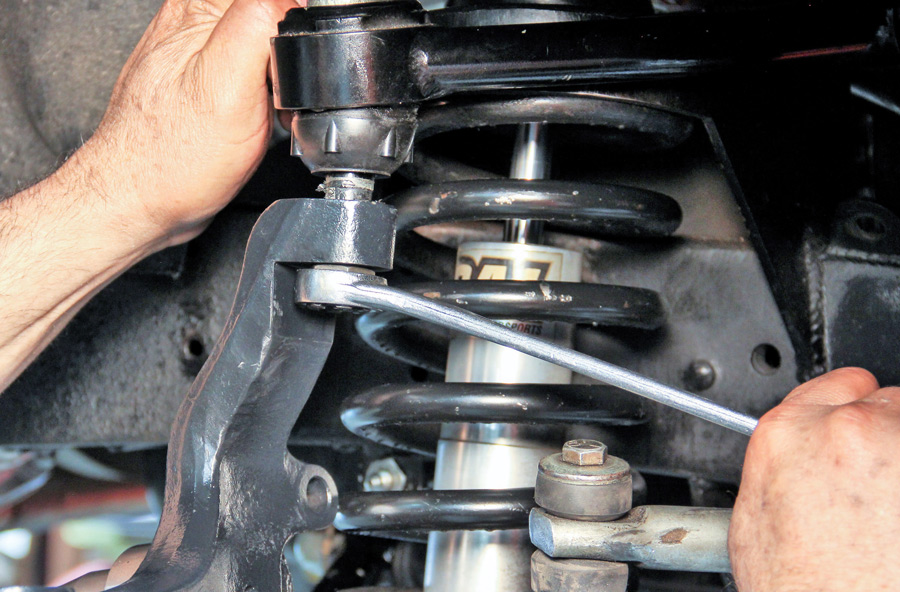 tighten the upper and lower ball joints with the castle nuts 