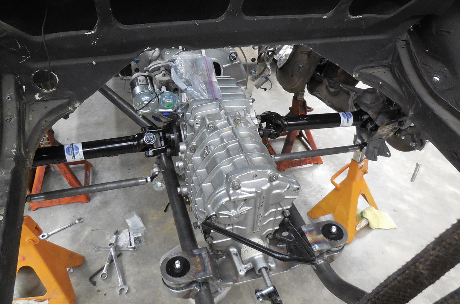 custom half shafts connect the transaxle to the hubs