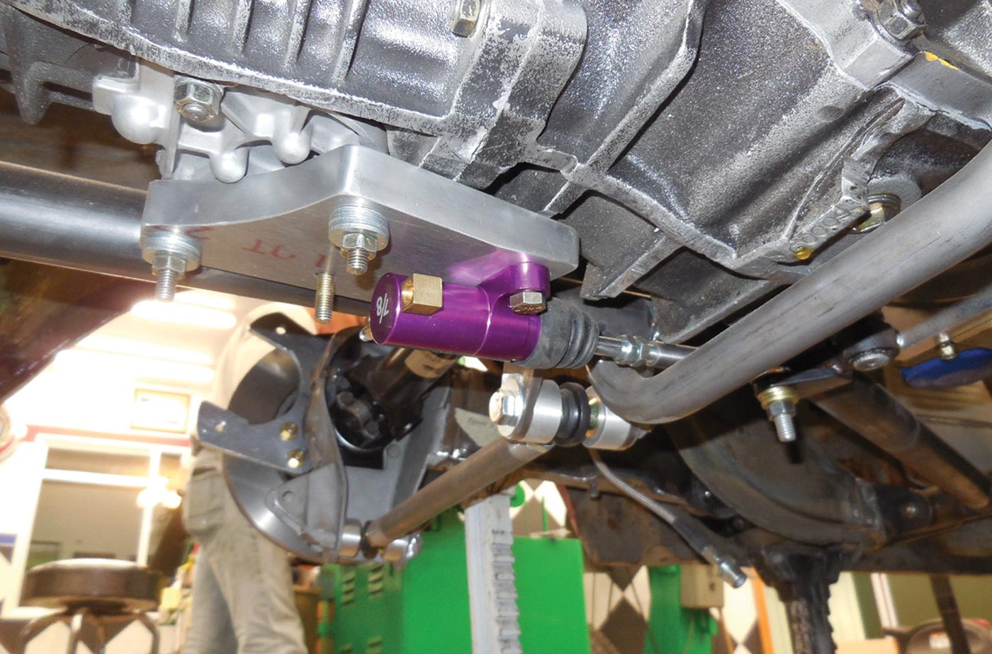 a hydraulic slave cylinder is mounted to the bottom of the transaxle