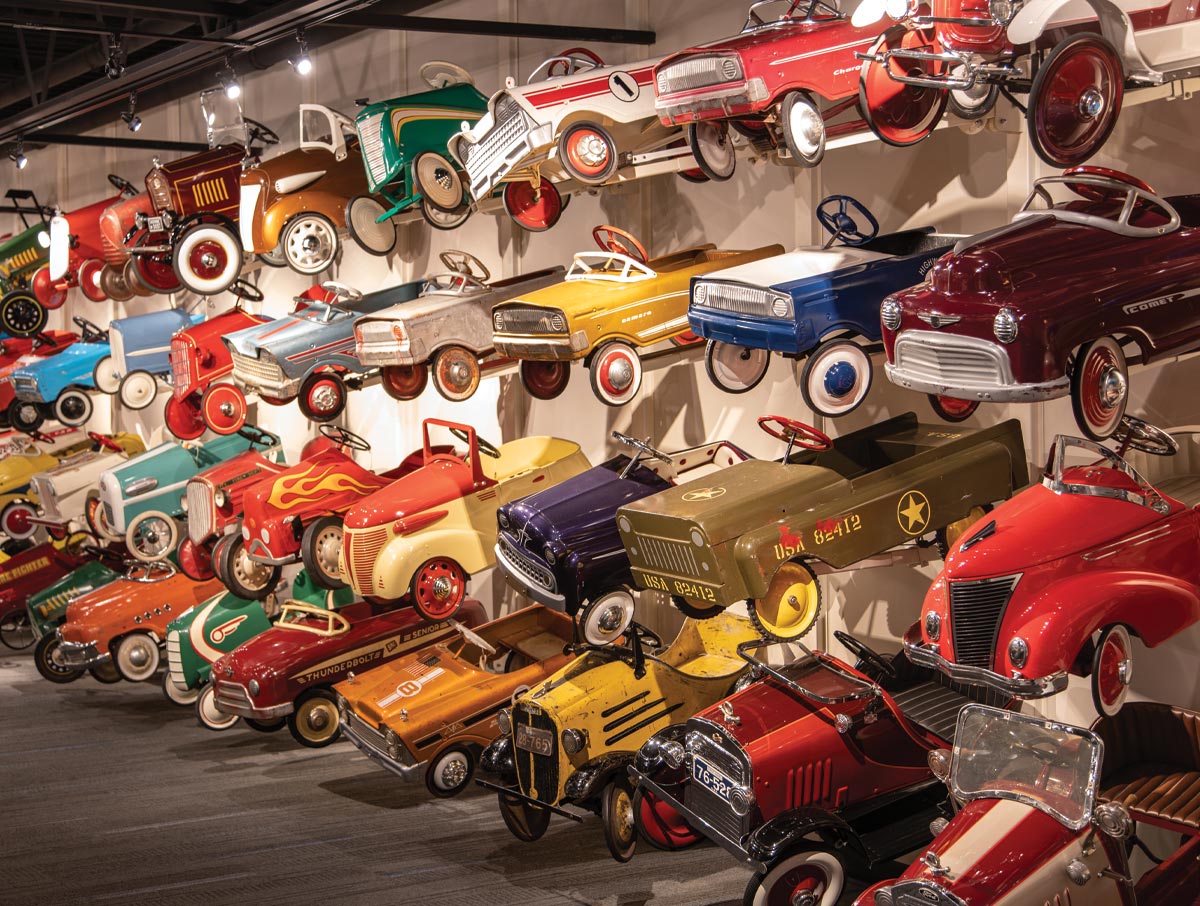 wall covered with vintage racing boxcars