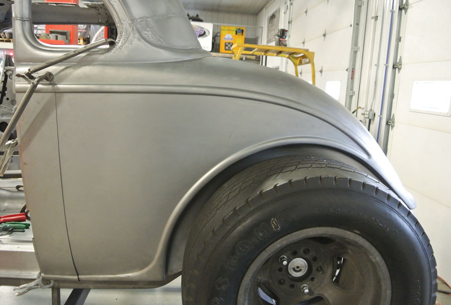 A preliminary fit of the SAR reproduction quarter-panels shows a basically good fit, although some modification would be required to fit these roadster quarters to the coupe body