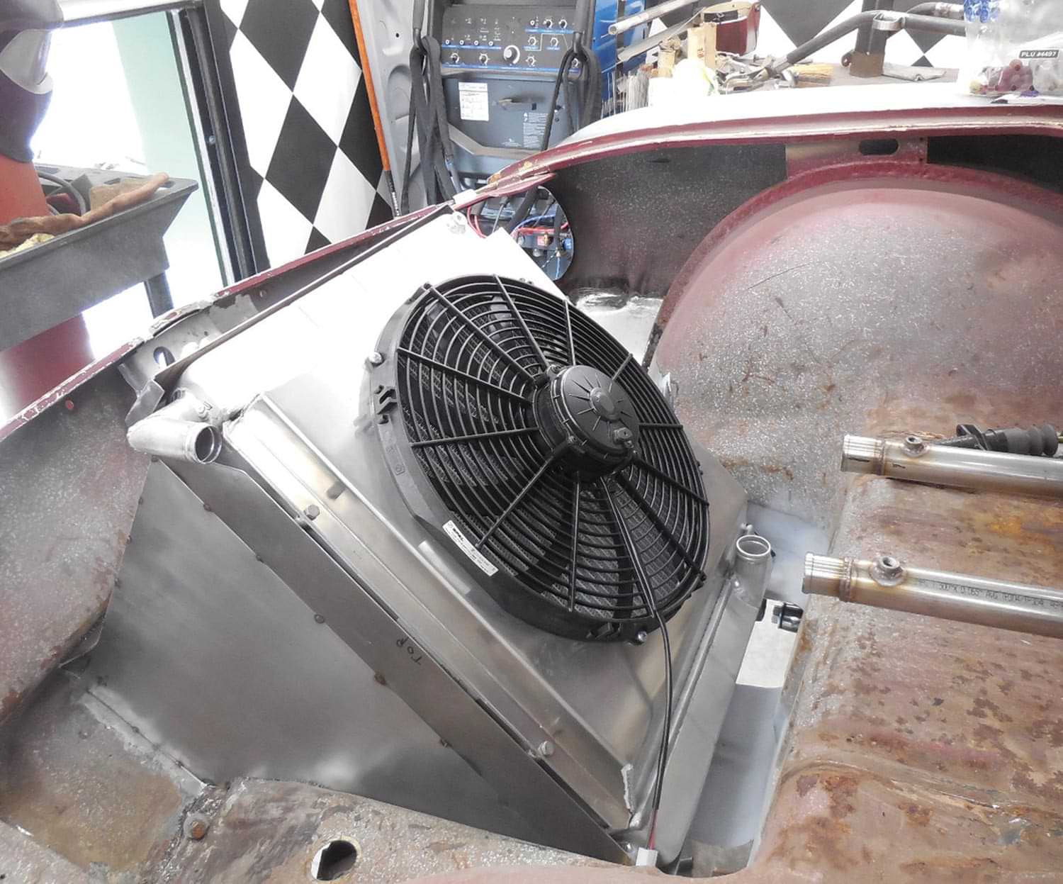 a radiator with the same dimensions that would be found in a Corvette is installed at an angle