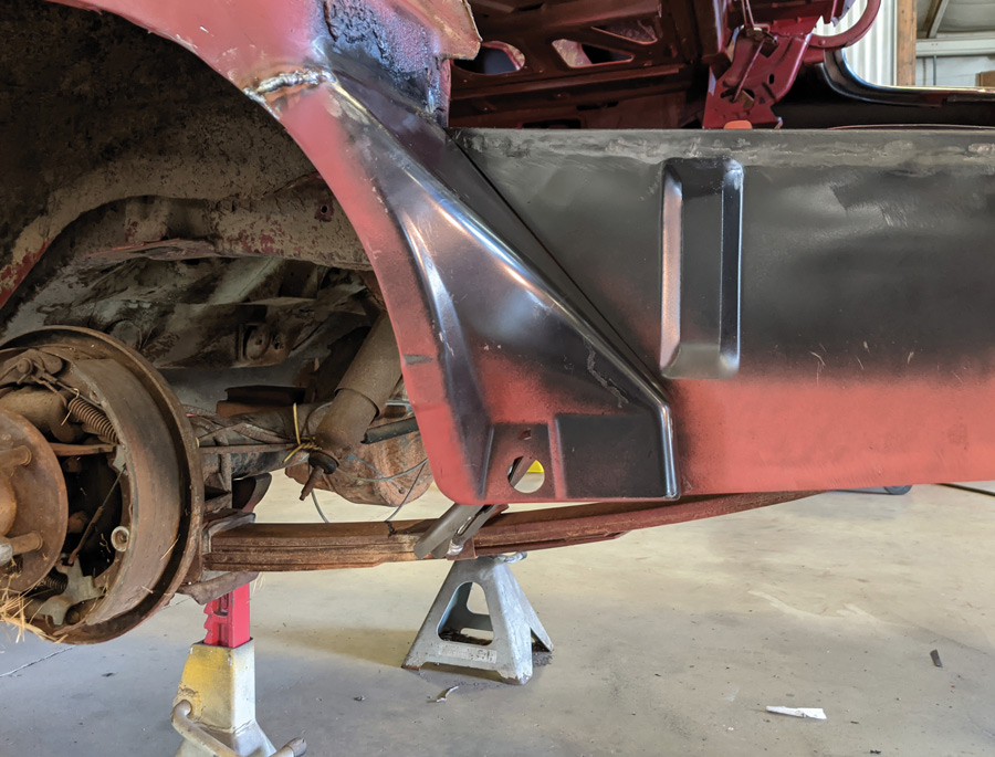 After testing a final time, TIC is happy with the alignment on the quarter-panel and we weld up the relief cut. Follow the same steps in cleaning up this area. 