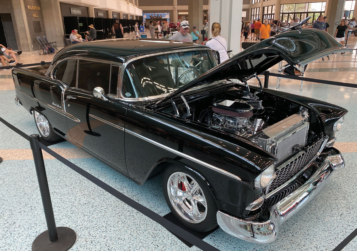 Black classic hot rod with open hood