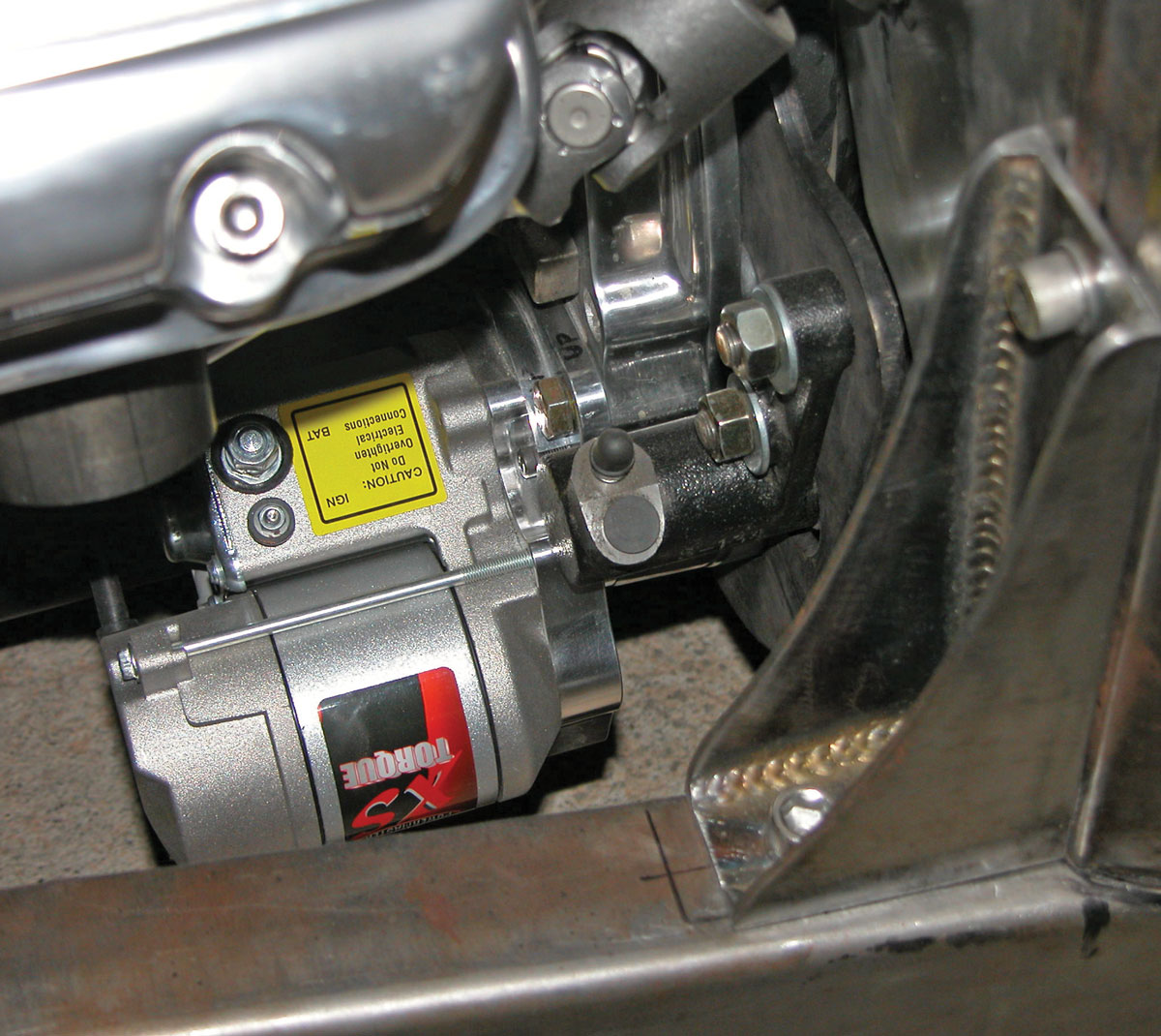 Tom uses a Powermaster XS Torque starter along with a 100A 1-V groove pulley (they come in one- or three-wire) alternator