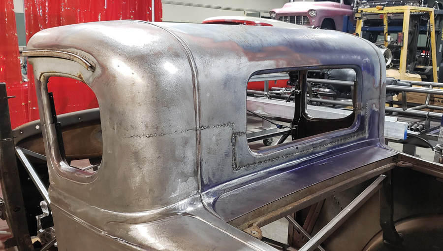 The Model A’s vertical seam reveal (that comes up from the decklid opening to the top of the roof) is in place now but will be removed later.