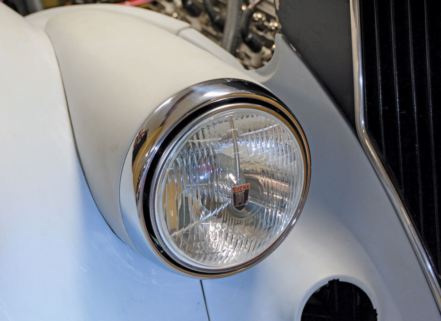 view of the finished Lucas PL halogen lights rotated properly in the ’41 Chevy headlights