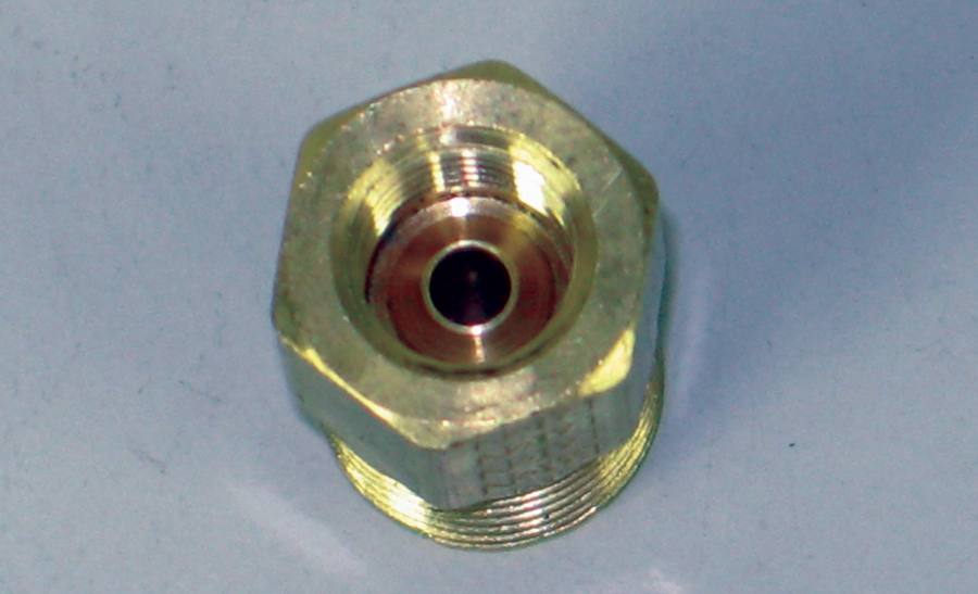 This is the seat in an inverted flare fitting. The combination of the nut, tapered tubing, and the seat in the fitting provide a leak-free seal.