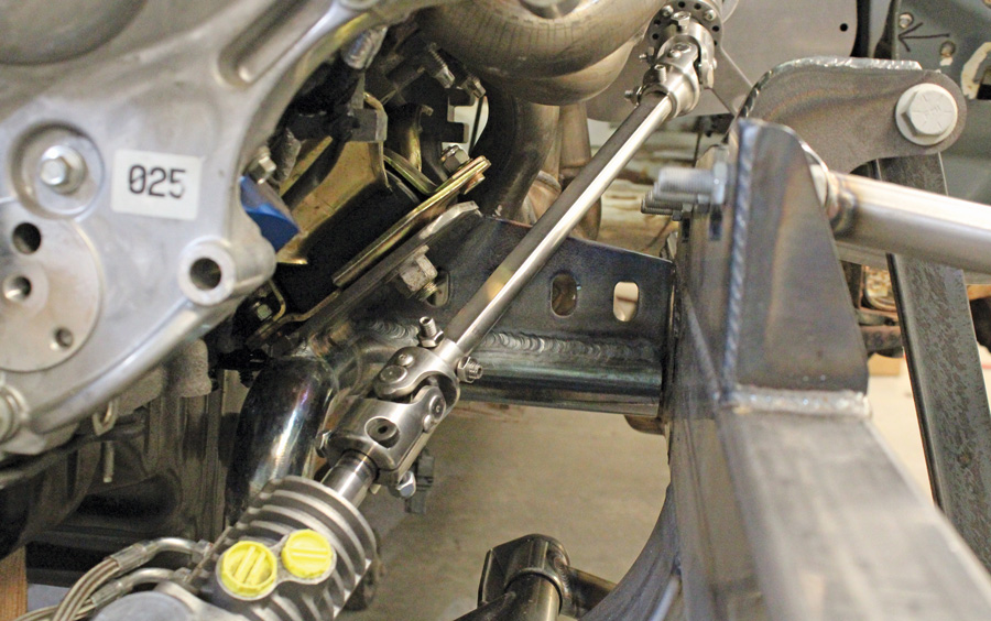 Careful planning pays off, the steering shaft fits over the top of the engine mount bracket with room to spare. 