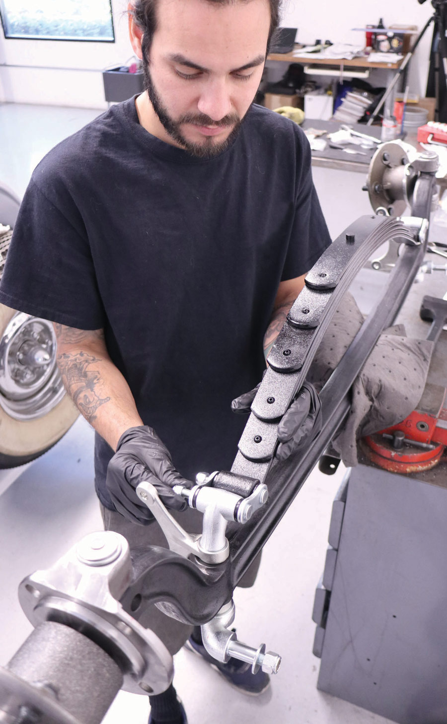 After  Arriero installs the reversed-eye super-slide spring, it’s time to slide the axle assembly under the roadster.  