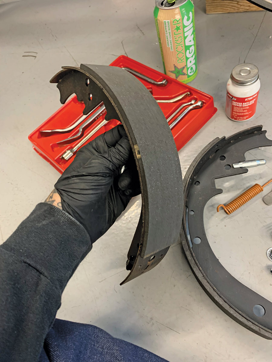 The Bendix brakes use a leading and trailing shoe design; the shorter-lined shoe is installed toward the front. 