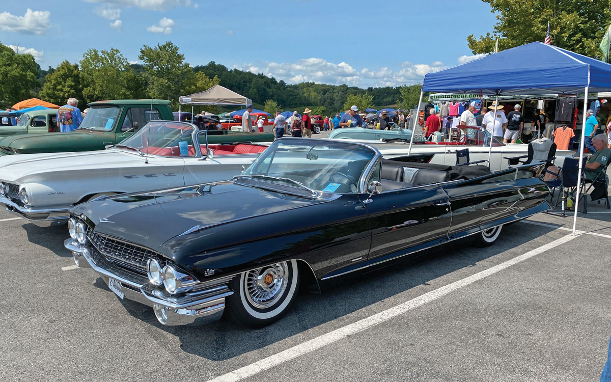 Mike McCallum with his triple black ’61 Caddy de Ville ’vert is more proof that big cars are oh-so cool–and make great drivers