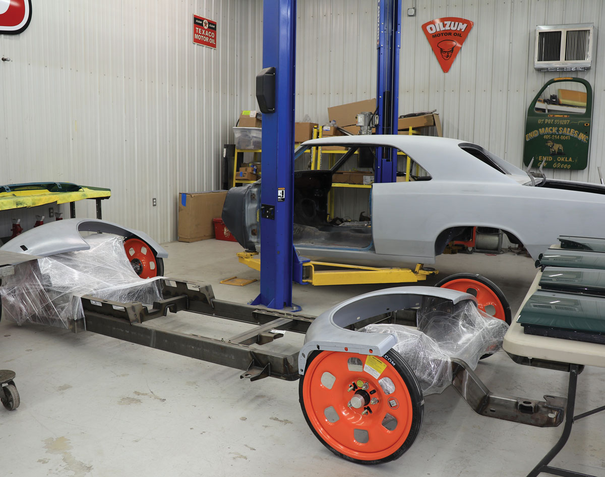 In the foreground a Roadster Shop rolling chassis for ’73-87 Chevy C10 pickups on Guniwheels