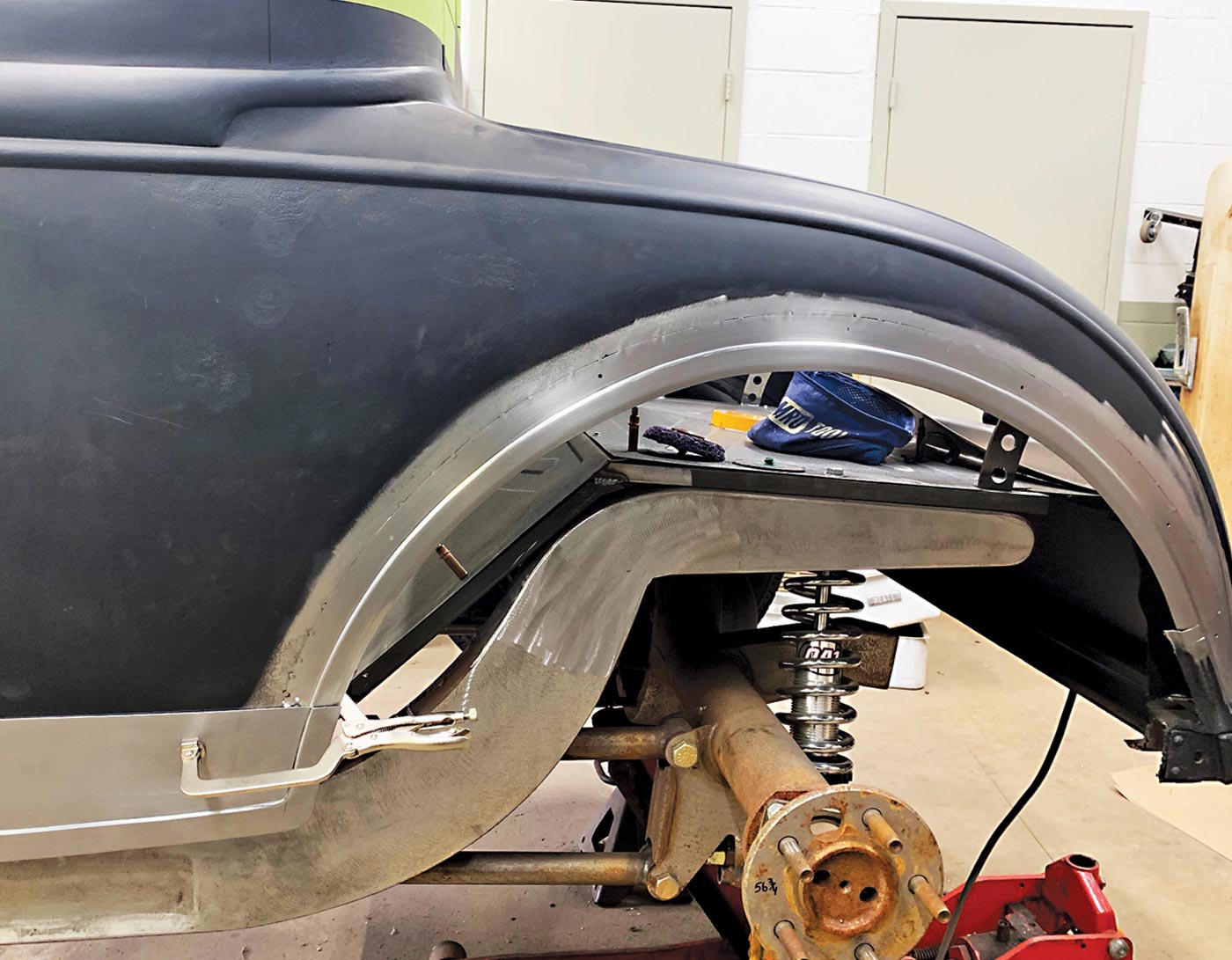 the reveal on the bottom of the patch panel is given a subtle curve to follow the contour of the frame