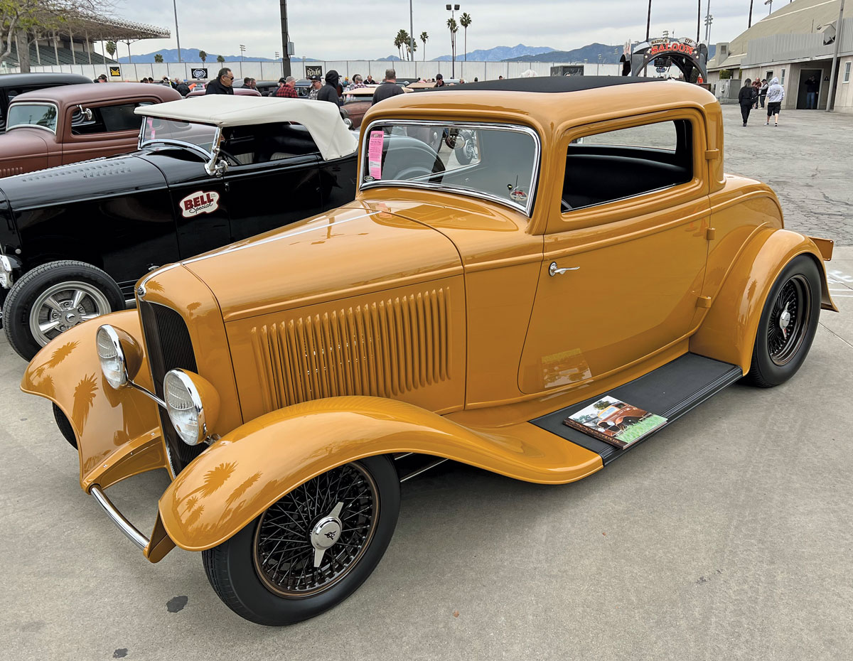 Phil Becker was on hand with a second hot rod, this time his ’32 Ford three-window coupe in the specialty Deuce Celebration parking area