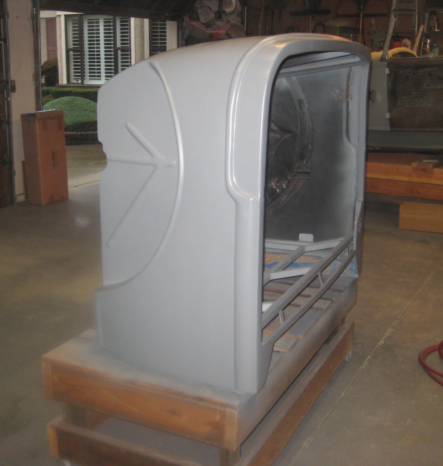 the rear body section sits on its face, covered in final primer