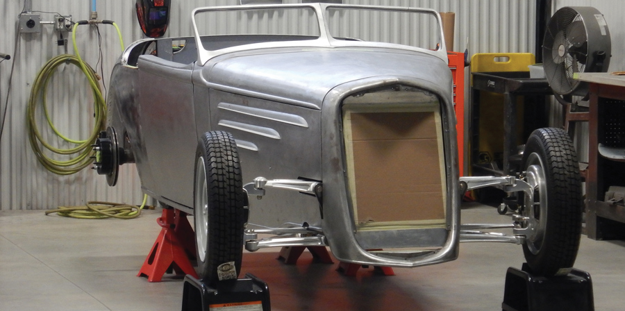 This is a great view, showing how the lines of the body converge toward the front. The windshield frame was machined from aluminum billet, then carefully hand-massaged to get the proper fit and contour.