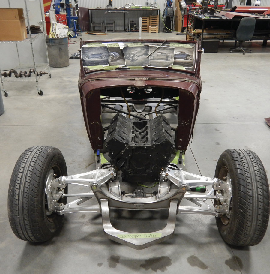 The chassis was built by Roadster Shop, featuring a completely original design for the independent front suspension, utilizing pushrods and bellcranks to operate the longitudinal coilover suspension units mounted inboard of the framerails.