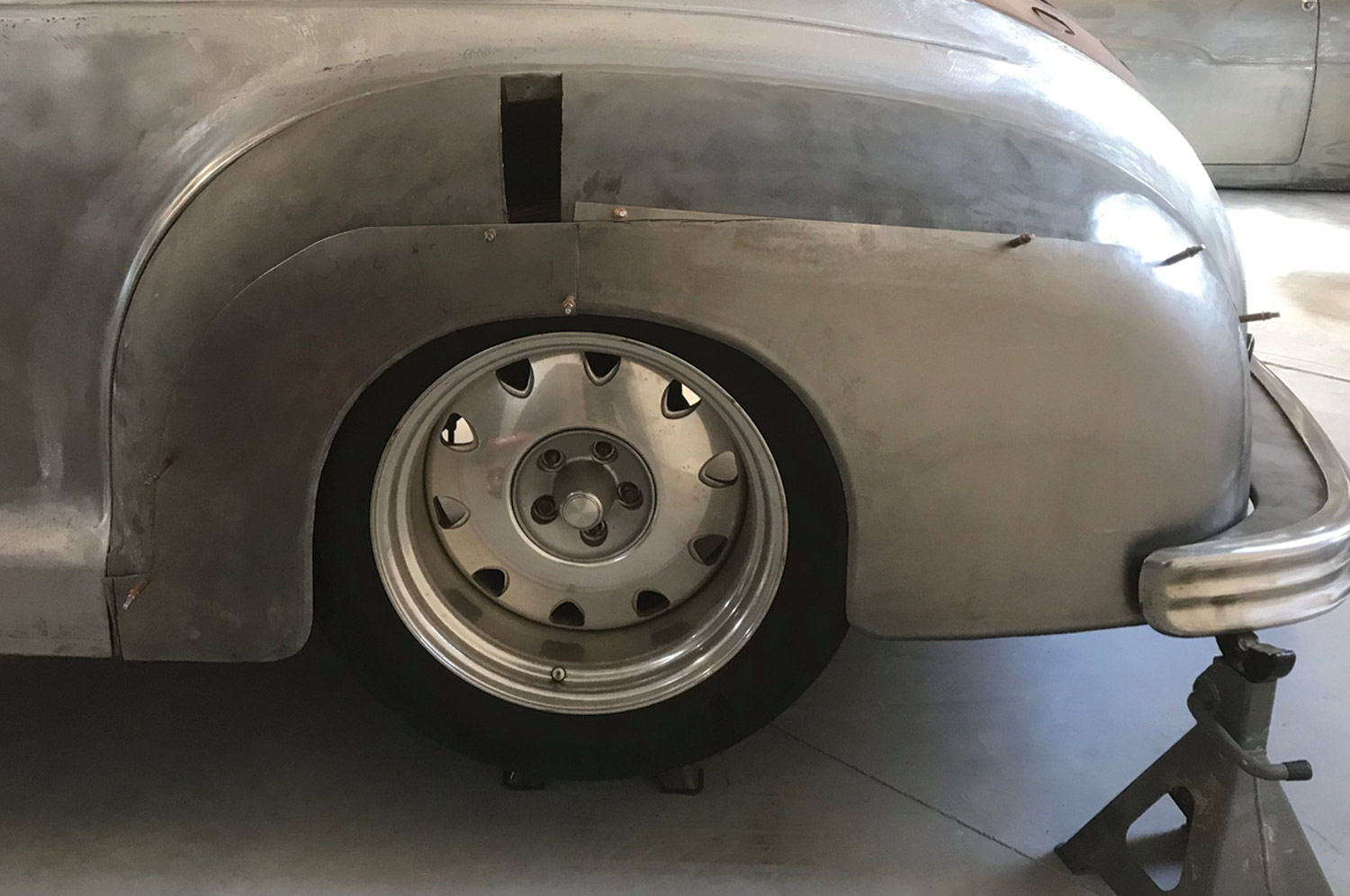 the ’49 Plymouth bumper and hand-formed splash pan are test-fit