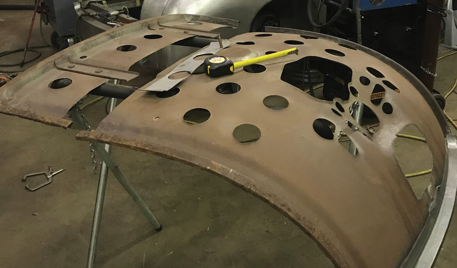 the decklid skin rests on a stand in two parts