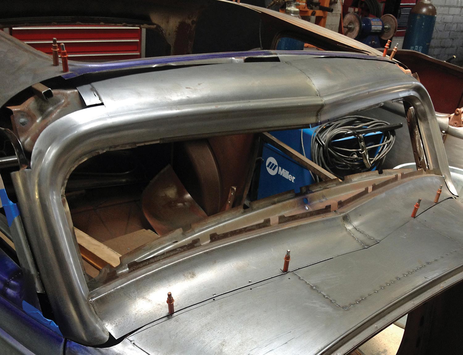 the roof panel pieces being painstakingly fitted together using Clecos