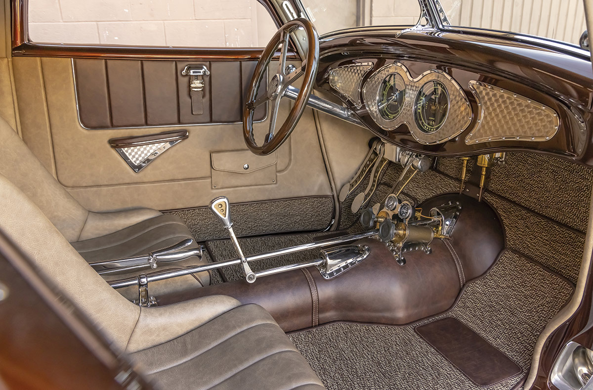 ’32 Ford interior view of wheel, dashboard, and gear shifter