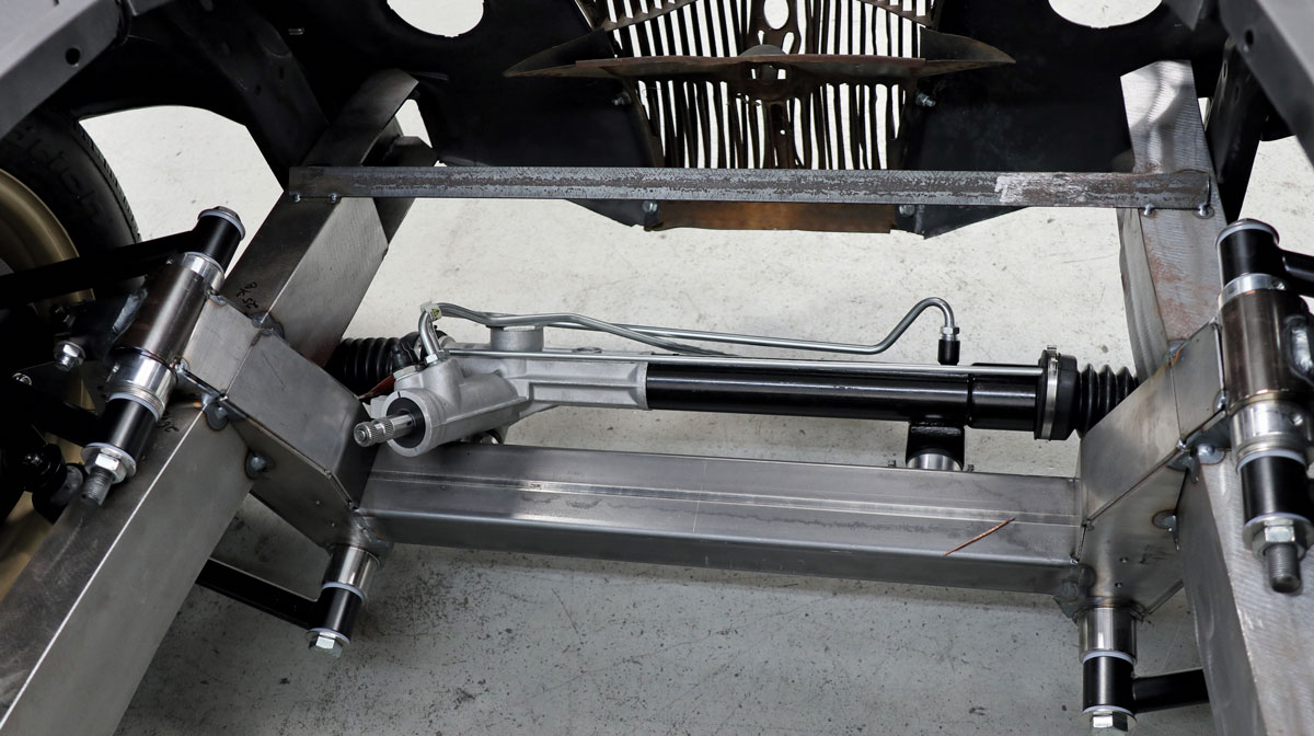 Underneath the ’36 Ford is a custom chassis utilizing Kugel’s IFS and IRS systems