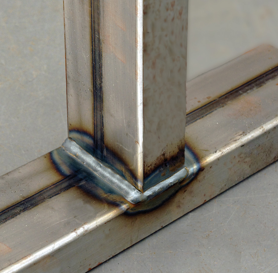 When welding rectangular tubing it’s best to do it in four steps, finding the most comfortable position for reaching each of the four faces.