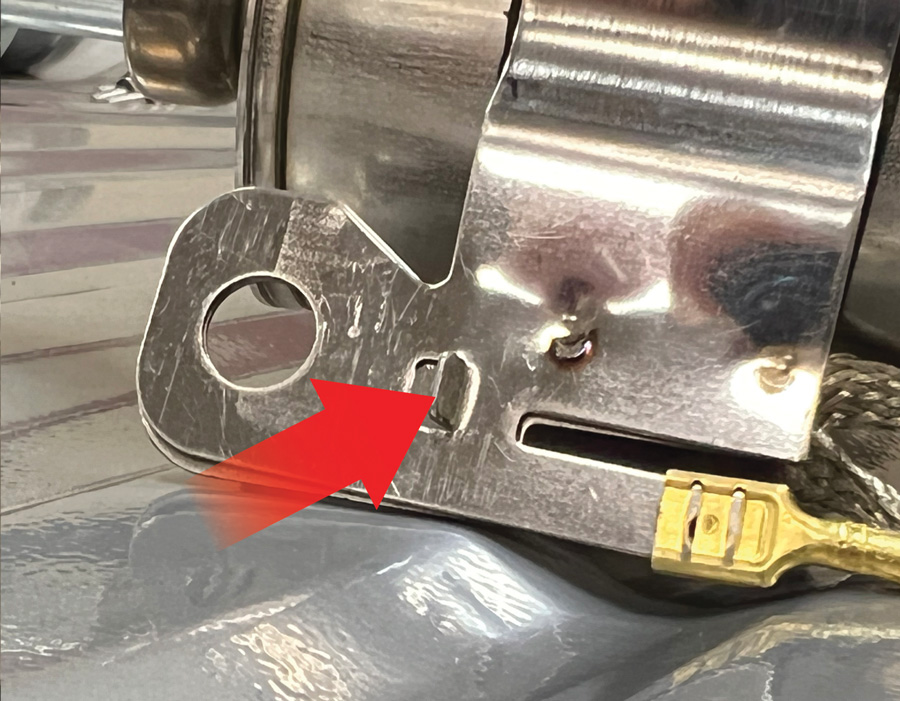 where the electrical connections enter the filter/regulator, and then attach to the mounting hole