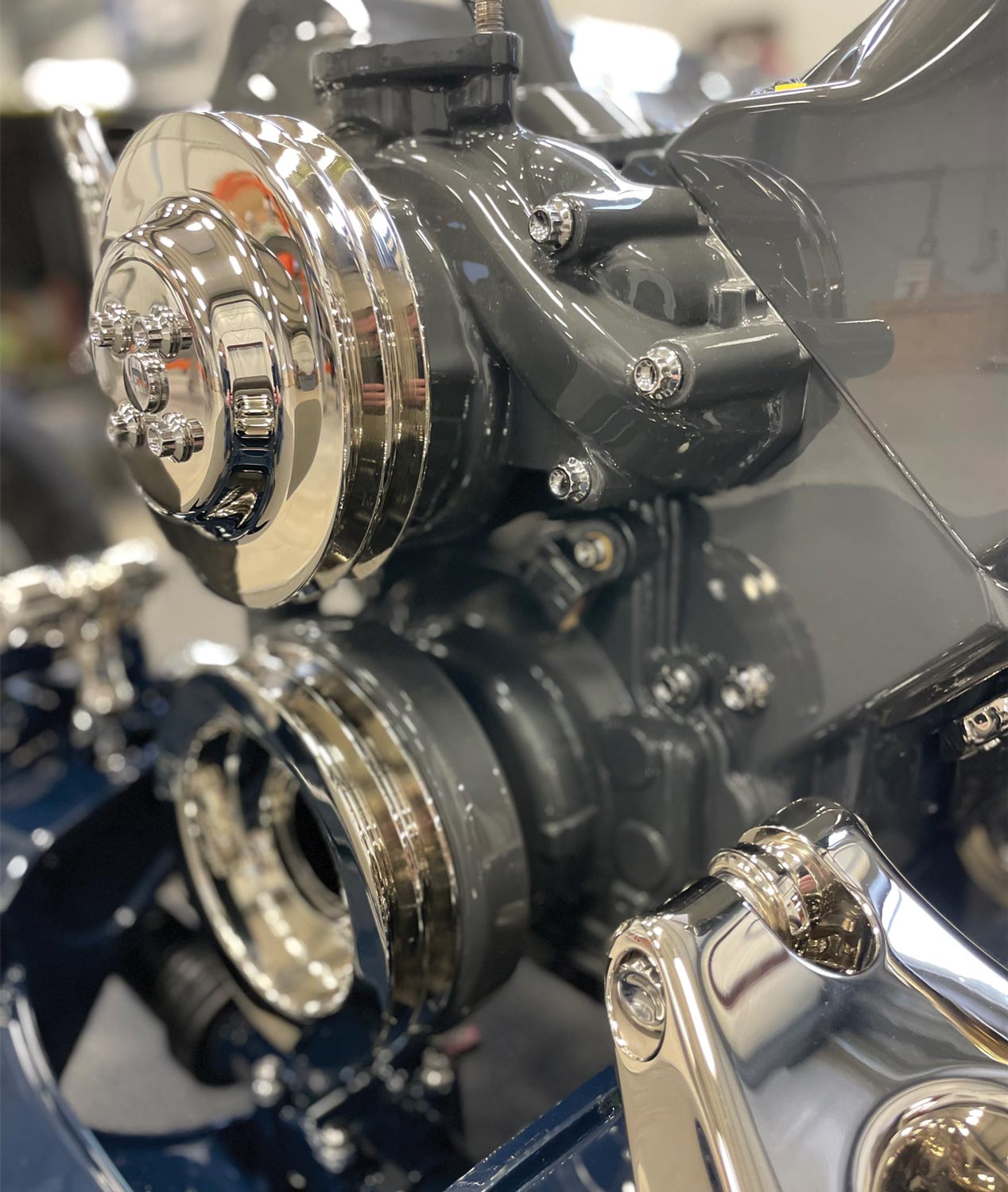 close view of the Edelbrock Victor Series water pump, installed with pulleys crafted by JHRS