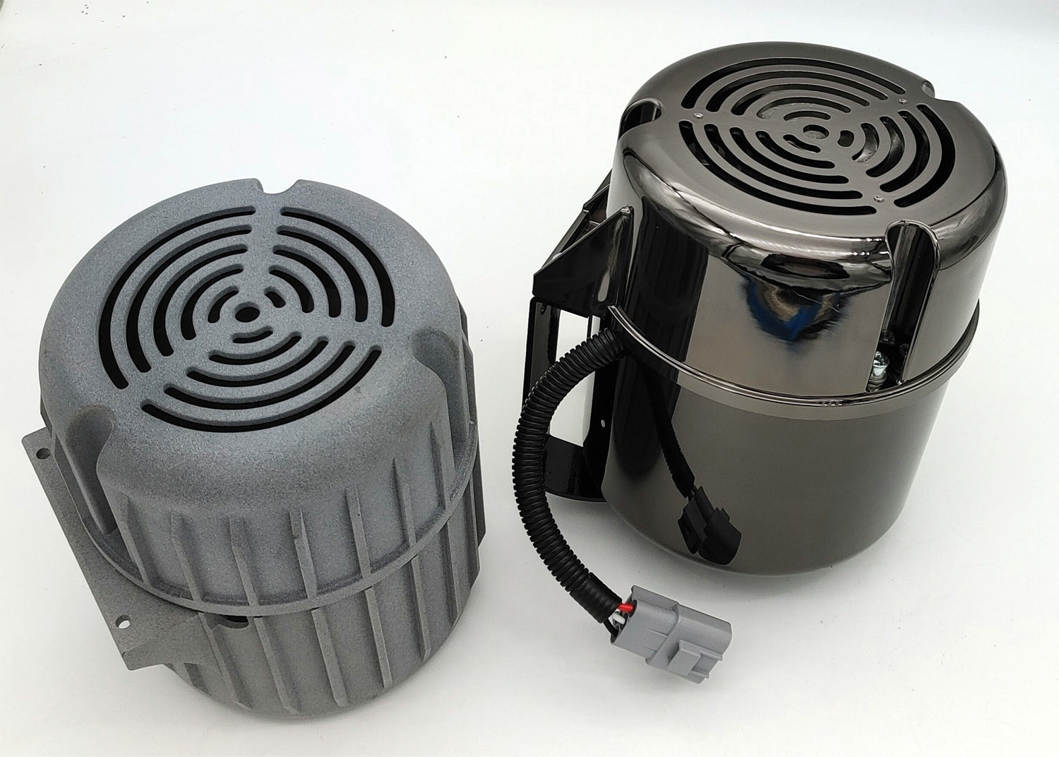 two examples of the vacuum pump kit: gunmetal gray (PN 410103) in an ABS plastic outer shell and the electroplated black (PN 410101)